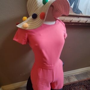 Sophisticated coral romper with pockets